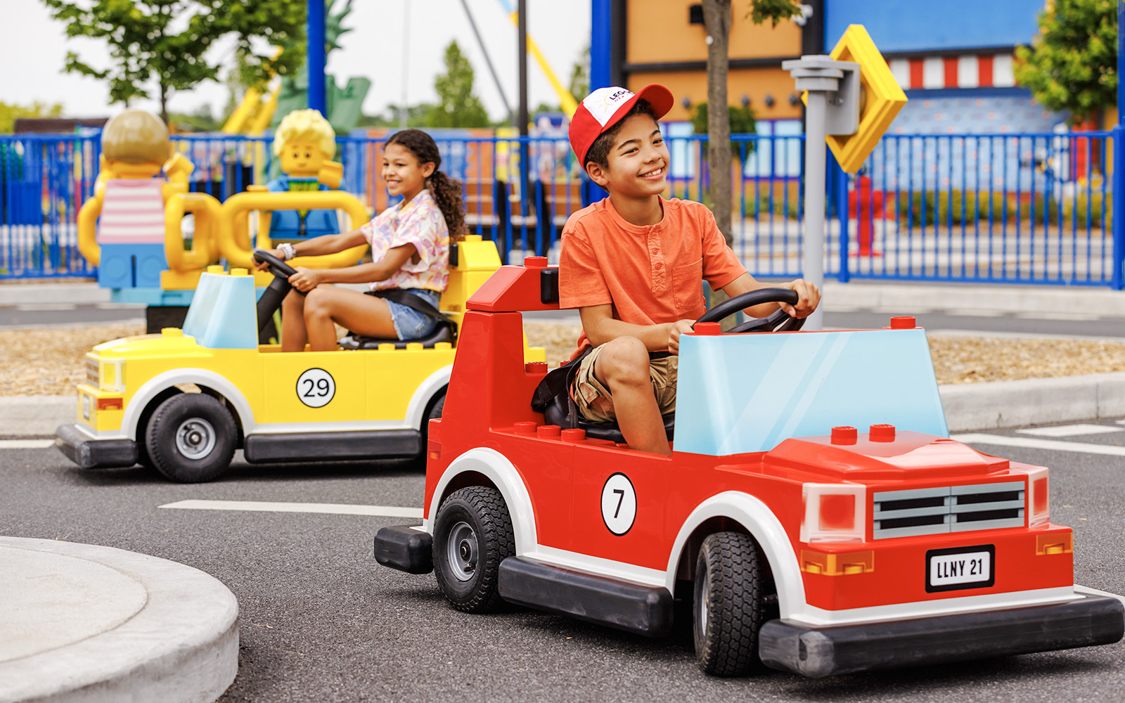 Children driving Lego cars at Legoland New York.