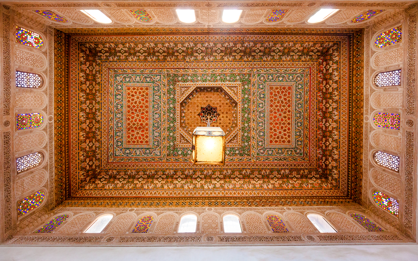 Ornate ceiling design at Bahia Palace in Marrakech, Morocco.