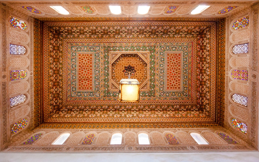 Ornate ceiling design at Bahia Palace in Marrakech, Morocco.