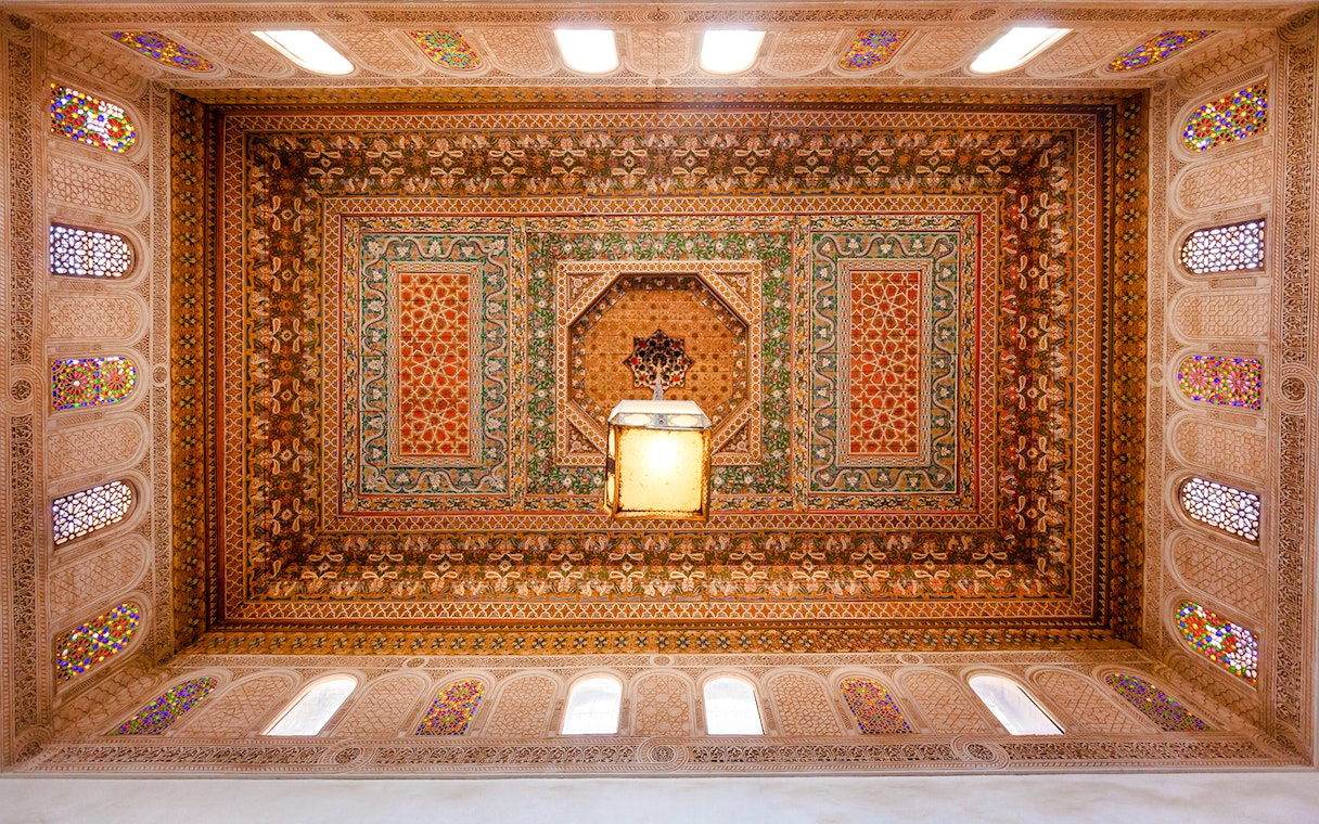 Ornate ceiling design at Bahia Palace in Marrakech, Morocco.