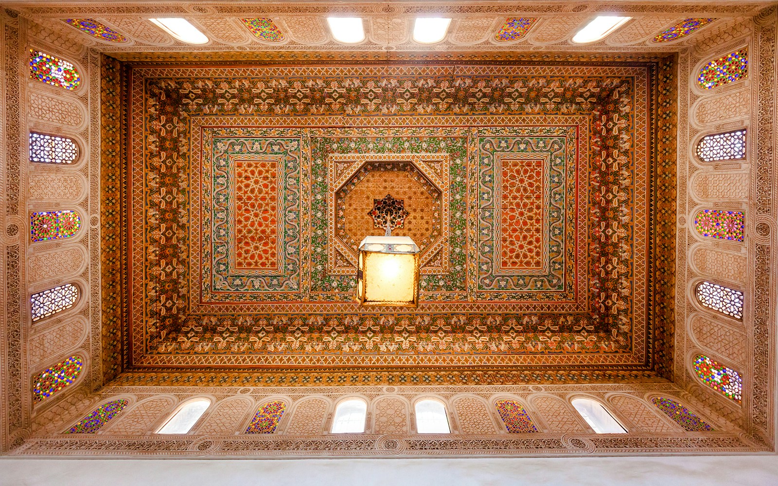 Ornate ceiling design at Bahia Palace in Marrakech, Morocco.