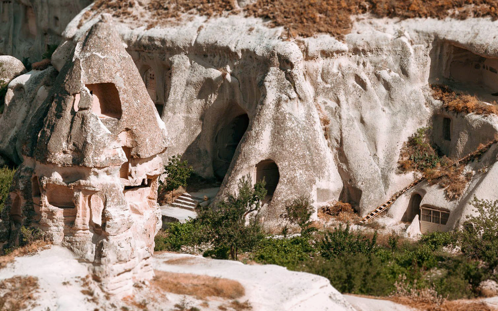 Unique rock formations and cave dwellings in Cappadocia, Turkey.