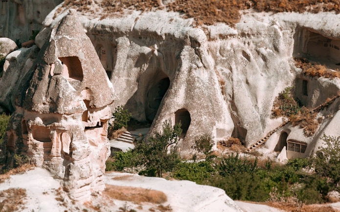 Unique rock formations and cave dwellings in Cappadocia, Turkey.