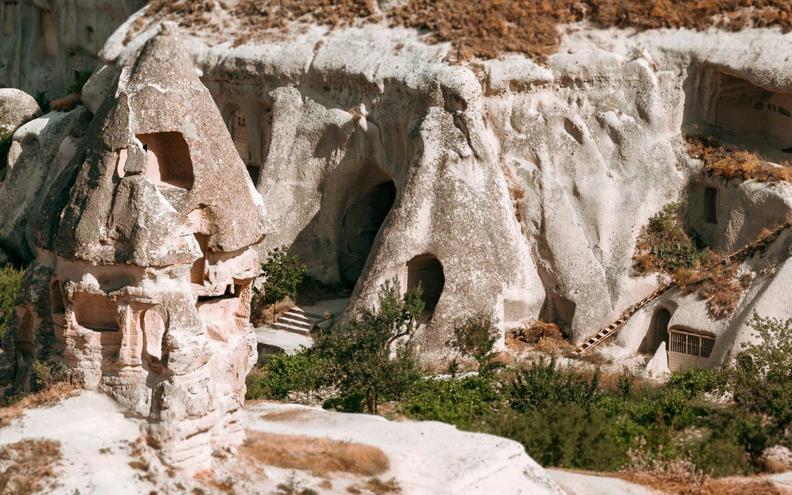 Unique rock formations and cave dwellings in Cappadocia, Turkey.