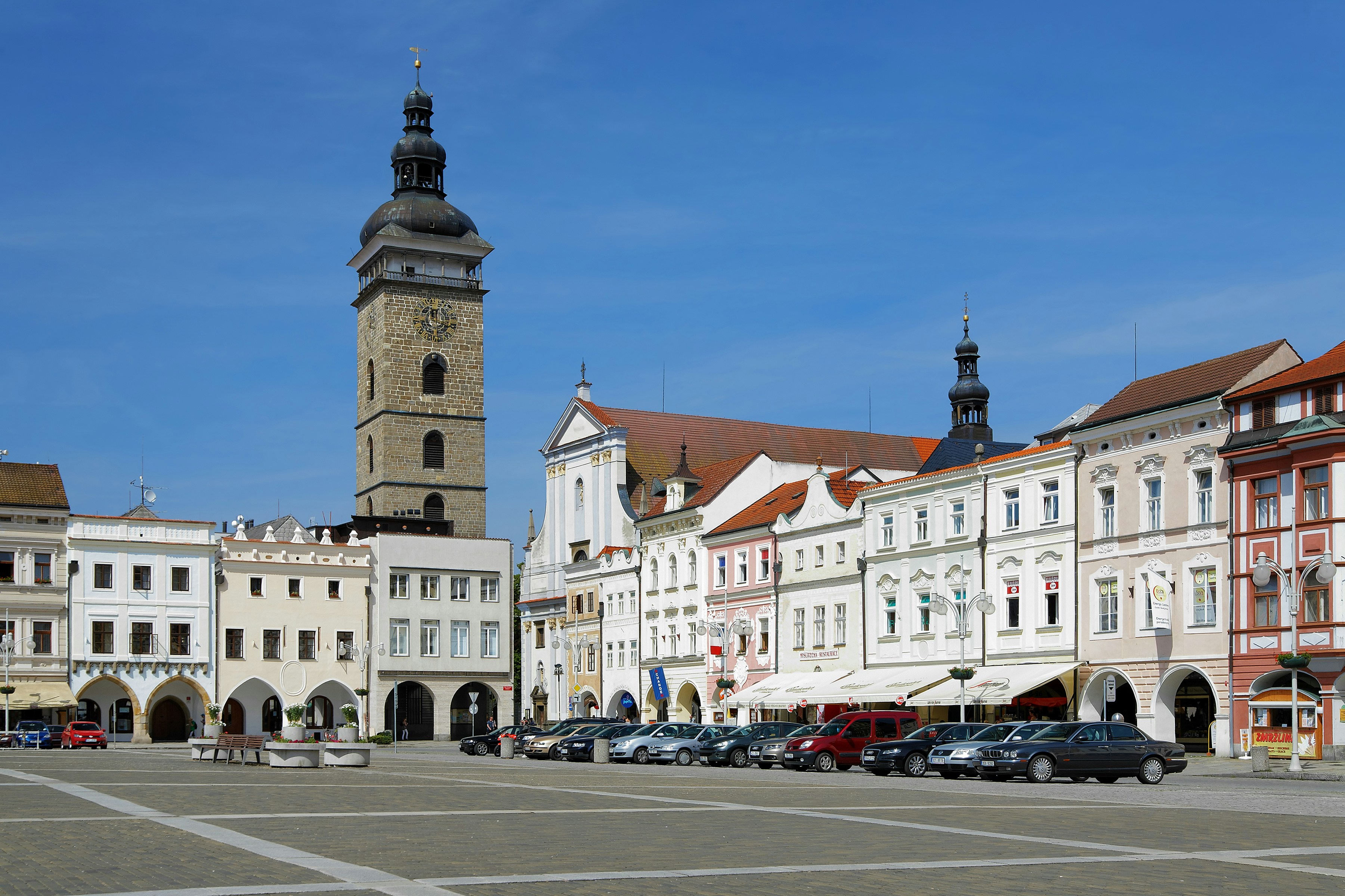 Black Tower in Cesky Krumlov with surrounding historic buildings.