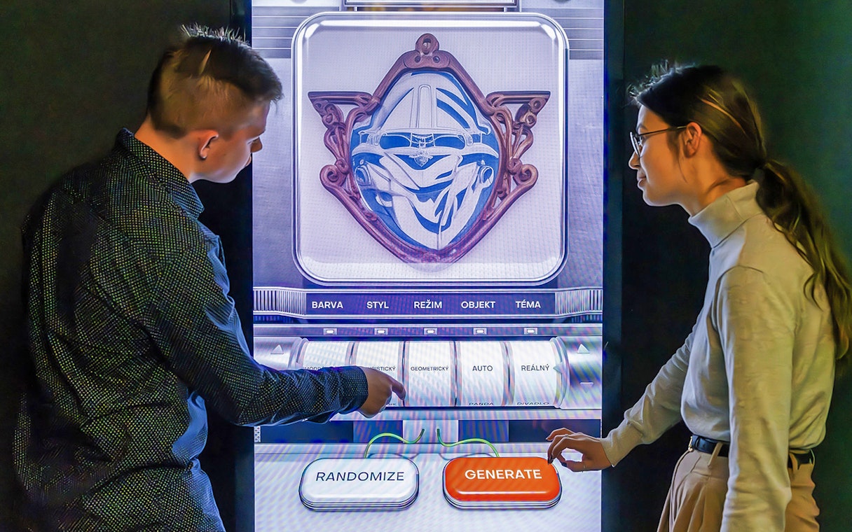 Guests interacting with a digital display at Praga Magica Interactive Exhibition.