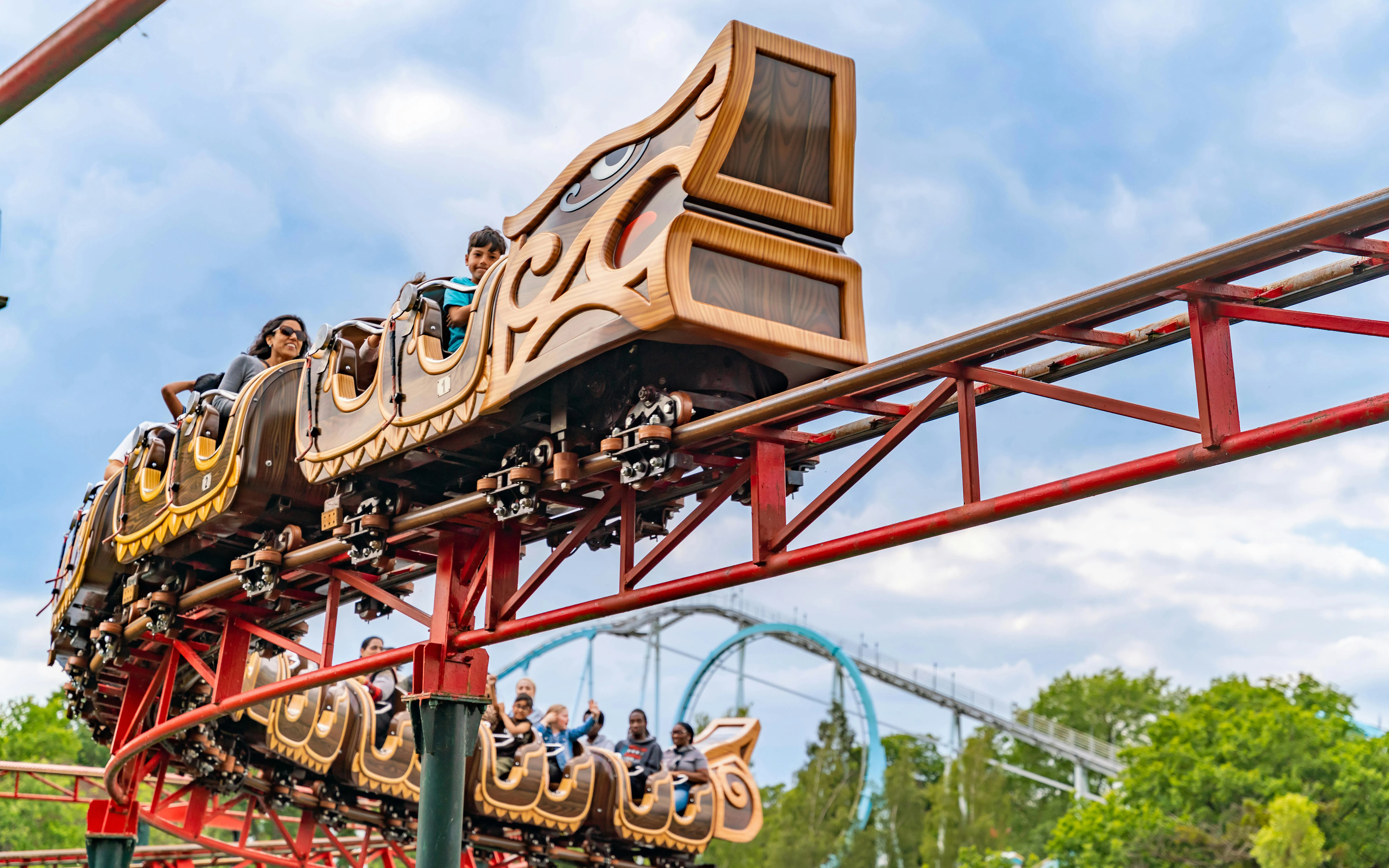 Roller coaster ride at Drayton Manor with passengers enjoying the thrill.