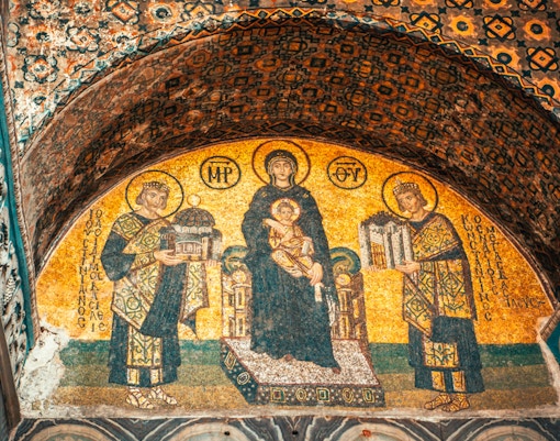 Hagia Sophia exterior with visitors in Istanbul, showcasing skip-the-line tour experience.