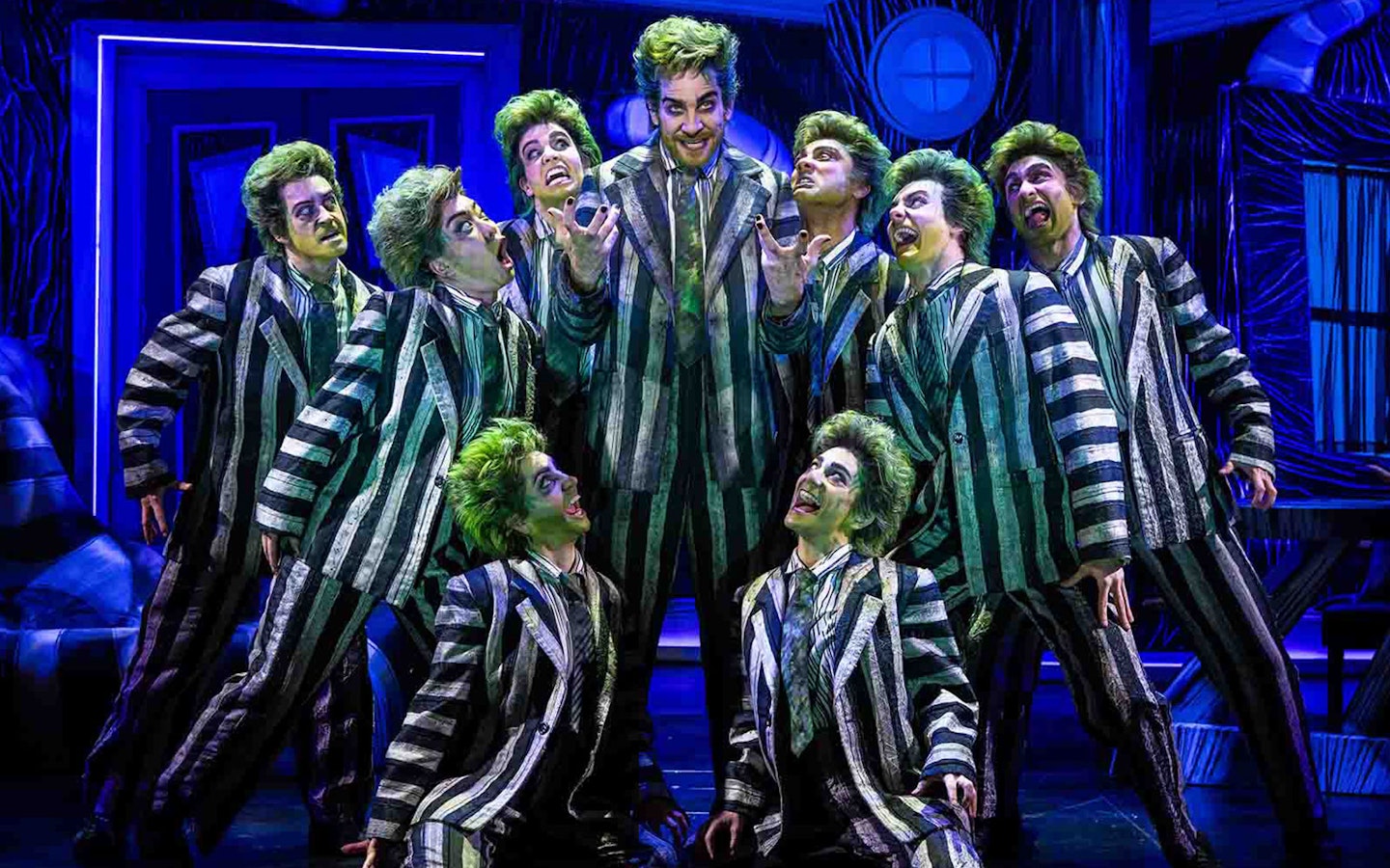 Beetlejuice stage performance with actors in striped suits, Brisbane.