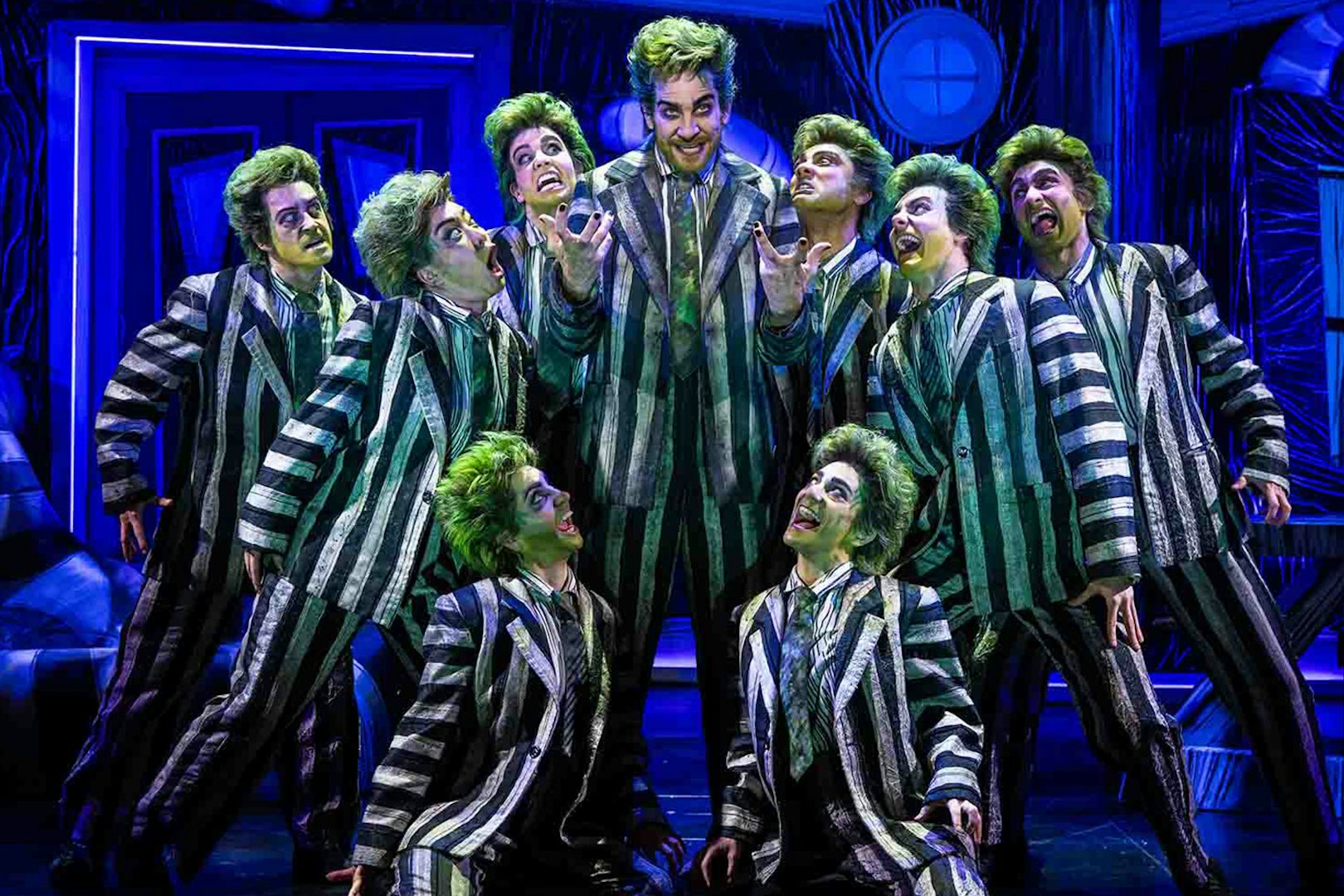 Beetlejuice stage performance with actors in striped suits, Brisbane.