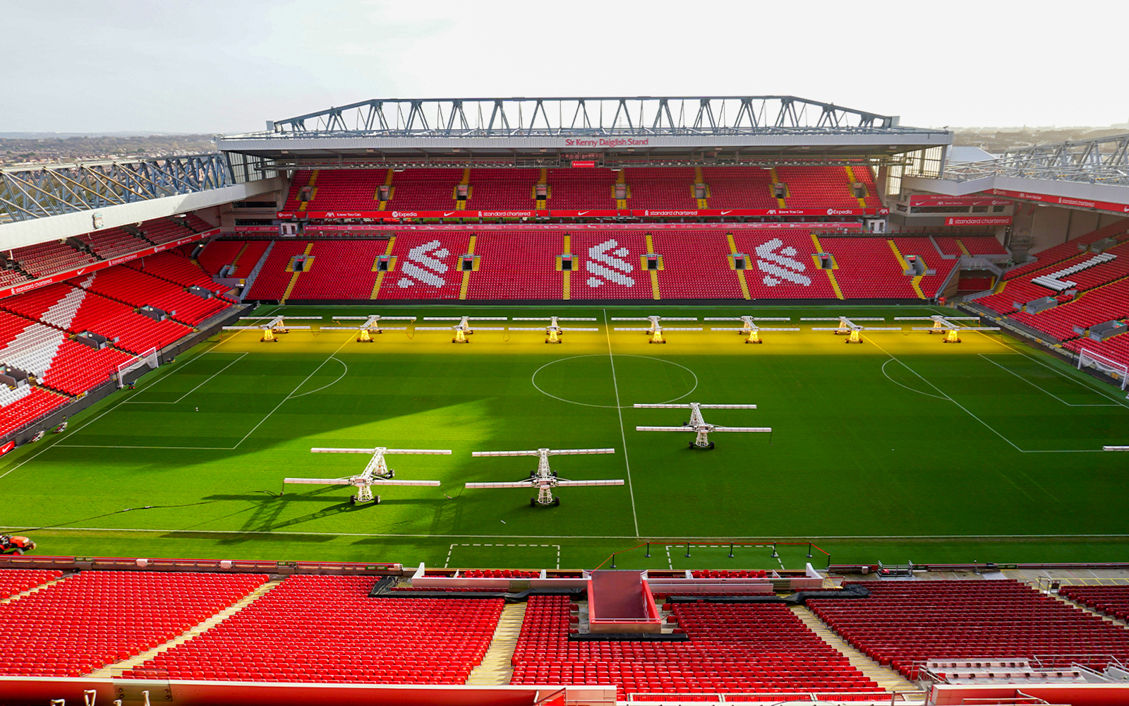 Anfield Stadium exterior with entrance gates in Liverpool, England.