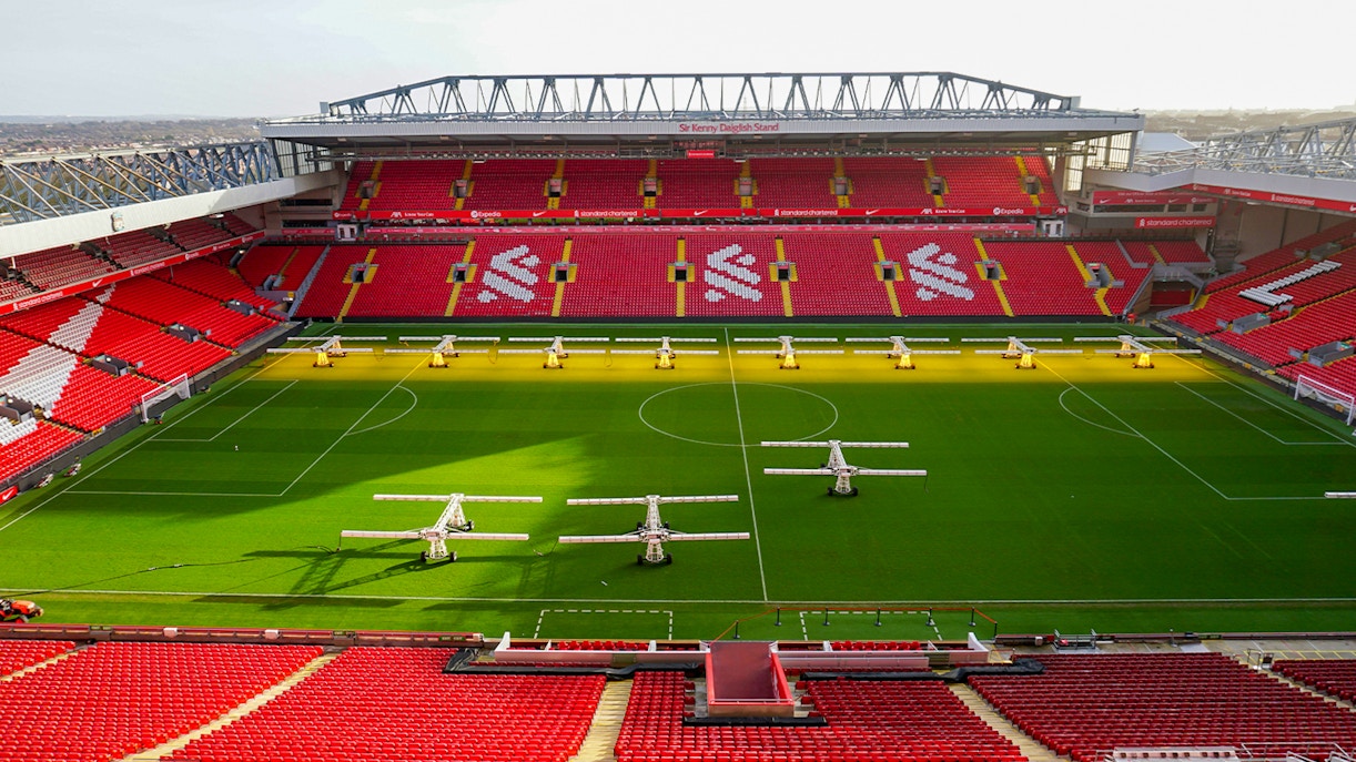 Anfield Stadium exterior with entrance gates in Liverpool, England.