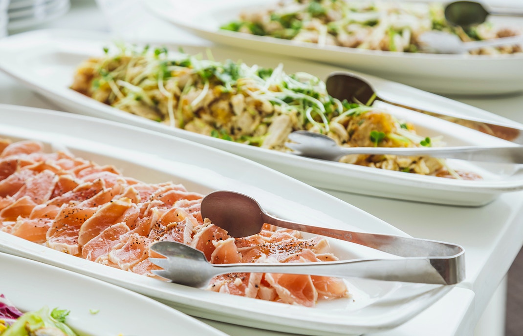 tour group enjoying buffet lunch
