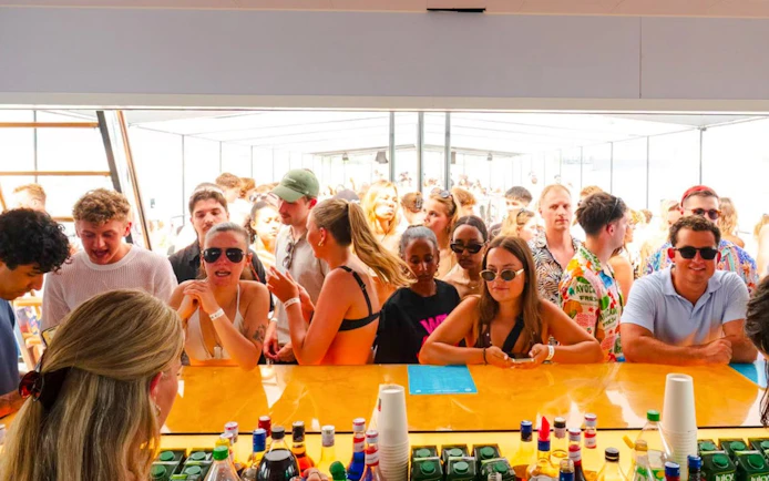 Guests at bar during Blue Lagoon Yacht Party from Split.