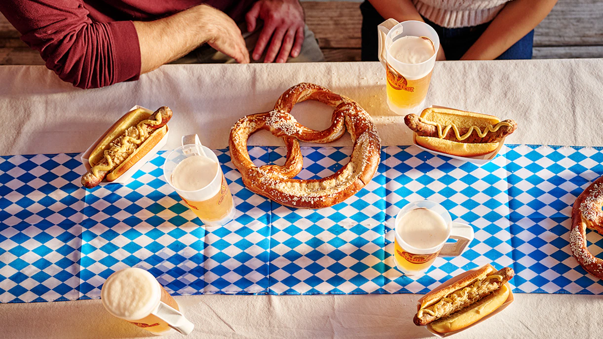 Pretzels, sausages, and beer on a table at Oktoberfest event, Canada's Wonderland, Six Flags.