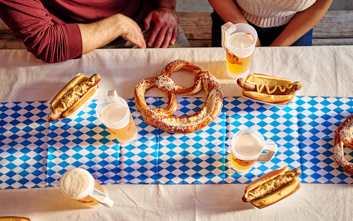 Pretzels, sausages, and beer on a table at Oktoberfest event, Canada's Wonderland, Six Flags.