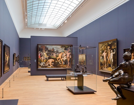 Rijksmuseum 17th century gallery with paintings and sculptures on display.