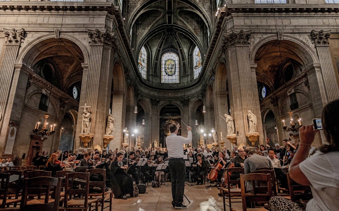 Orchestra performing inside St Sulpice Church, Paris.
