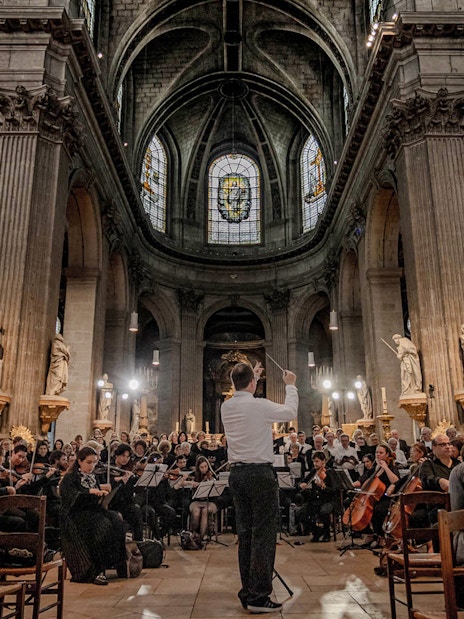 Orchestra performing inside St Sulpice Church, Paris.
