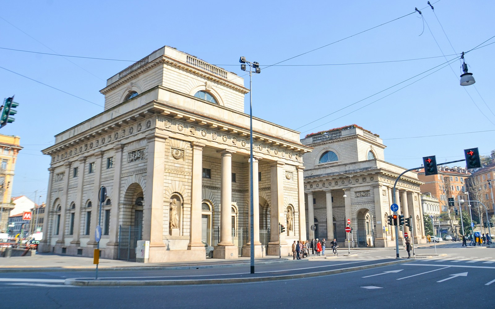Porta Venezia in Milan with historic architecture and bustling street scene.