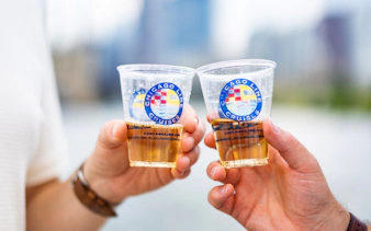 Clinking drinks on a Chicago Architecture Cruise.