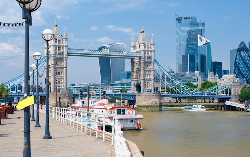 Tower Bridge and boats on the River Thames near London Tower Pier.