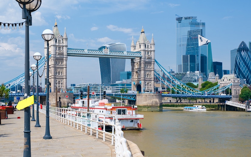 Tower Bridge and boats on the River Thames near London Tower Pier.