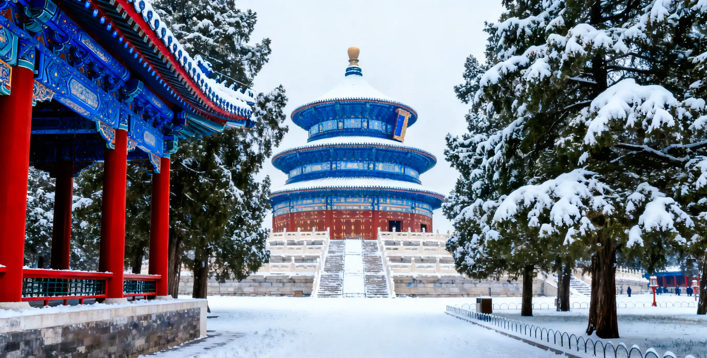 Temple of Heaven in Beijing covered in snow, showcasing traditional Chinese architecture.