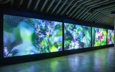 Digital art installation at Chaumont sur Loire Castle, featuring vibrant abstract visuals.