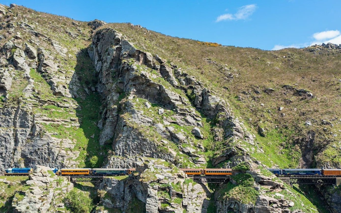 Train crossing Deep Stream Bridge on Taieri Gorge Scenic Rail Journey, New Zealand.