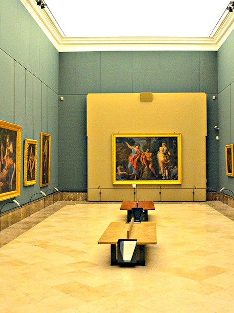 Art gallery with classic paintings on display during Capodimonte small group tour.