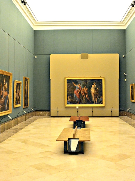Art gallery with classic paintings on display during Capodimonte small group tour.