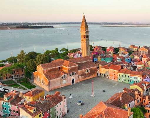 Aerial view of Church of Saint Martin Bishop in Venice, showcasing its architectural design and surrounding landscape.