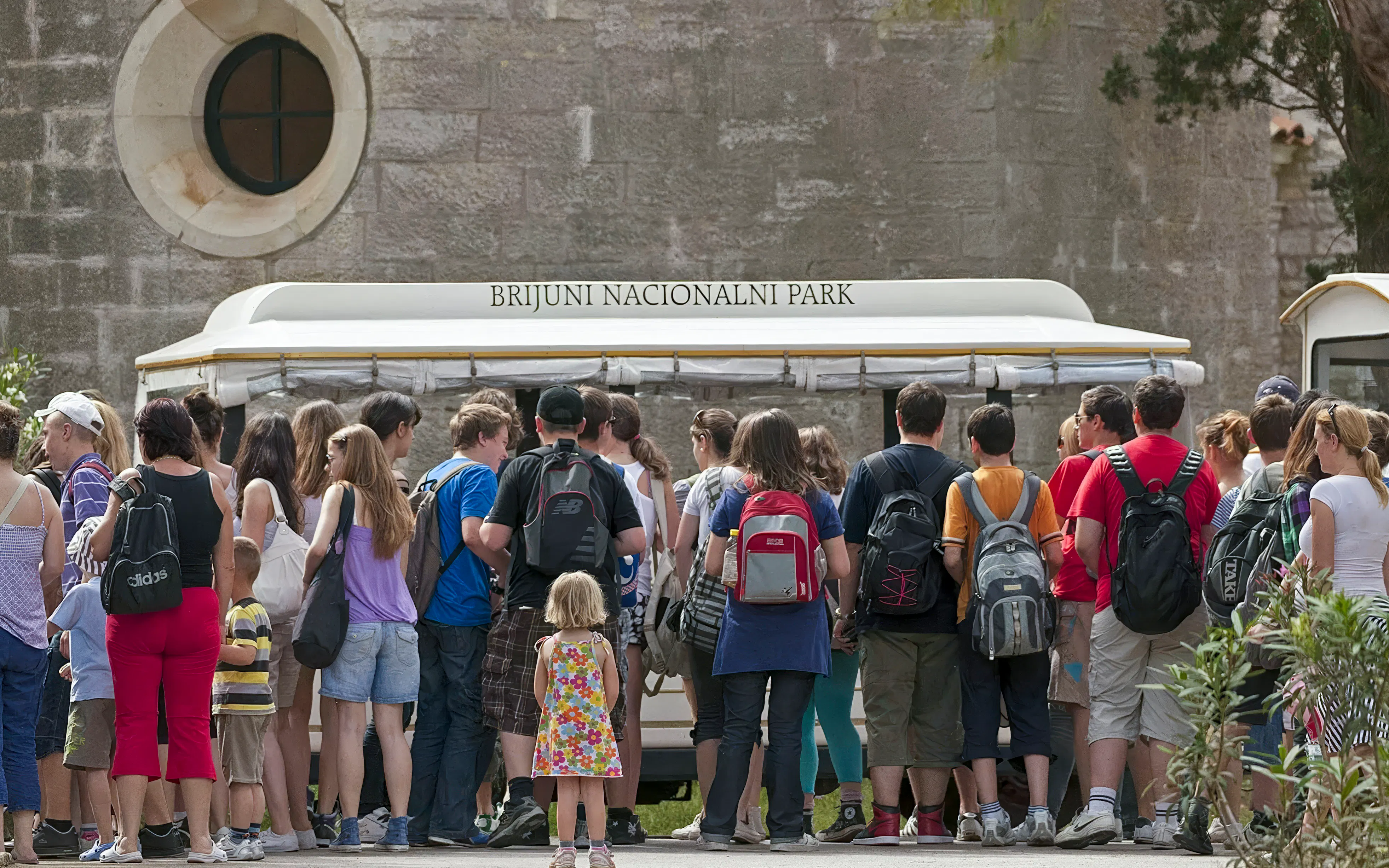Visitors gathering at Brijuni National Park entrance, Fažana tour.