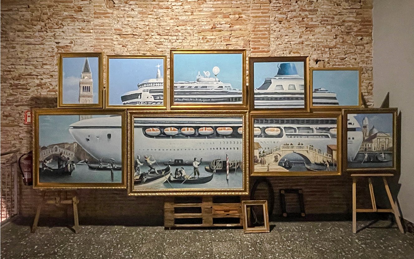 Framed artwork of cruise ship and gondolas at Banksy Museum Amsterdam.