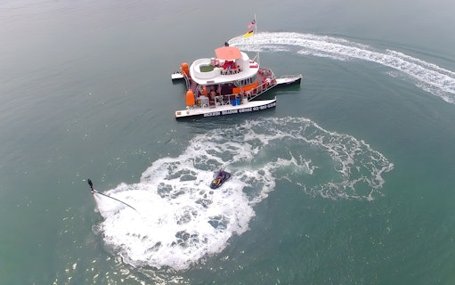 Dickson Dragon Cruise with flyboard activity in Port Dickson waters.