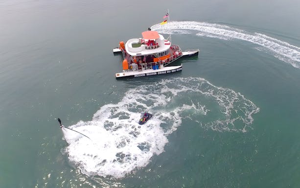Dickson Dragon Cruise with flyboard activity in Port Dickson waters.