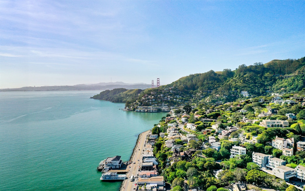 Aerial view of Sausalito and Golden Gate Bridge during helicopter tour, California, USA.