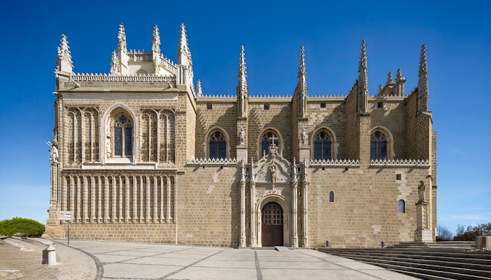 Monastery of San Juan de los Reyes exterior with Gothic architecture in Toledo, Spain.