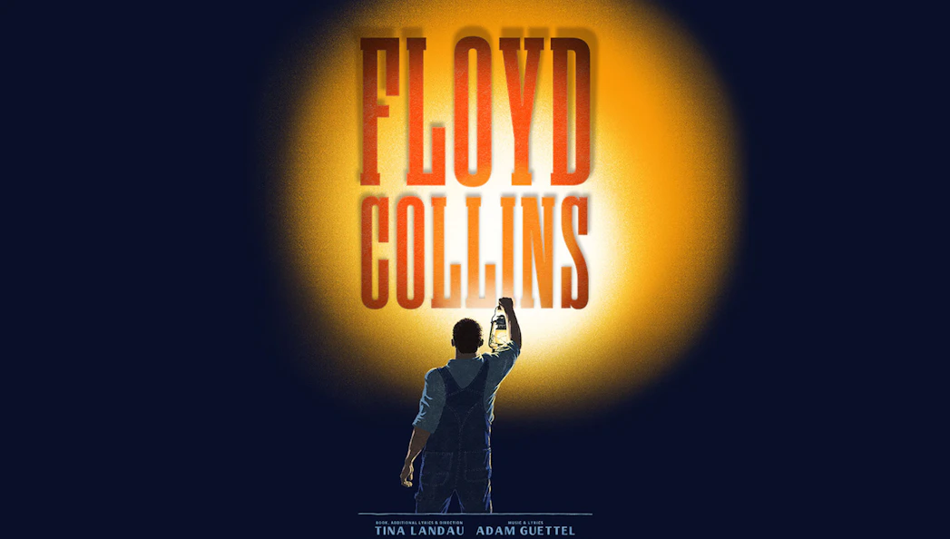 Person holding lantern under Floyd Collins text on dark background