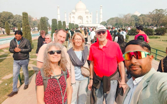 Visitors enjoying the Taj Mahal with priority entry, Agra.