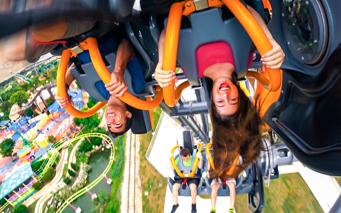 Riders upside down on BATMAN™ The Ride at Six Flags Fiesta Texas.