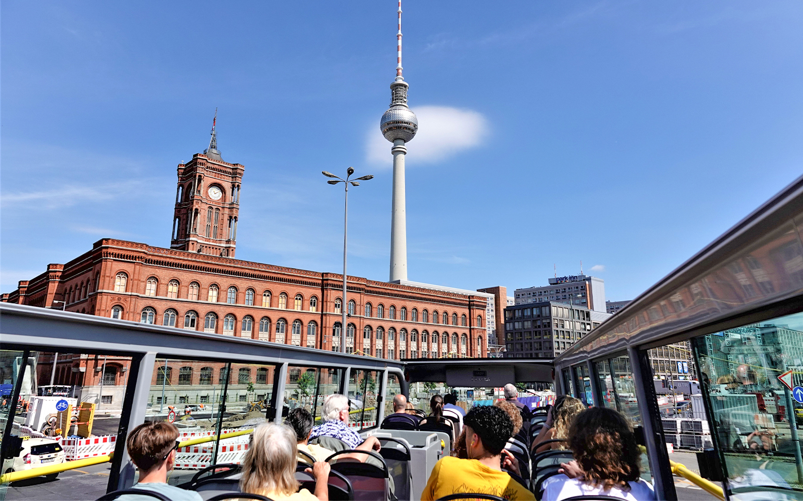 People on a Hop-On Hop-Off Berlin Tour