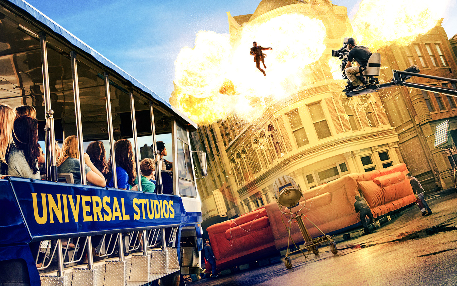 Universal Studios Hollywood tram tour with guests watching a movie stunt explosion scene.