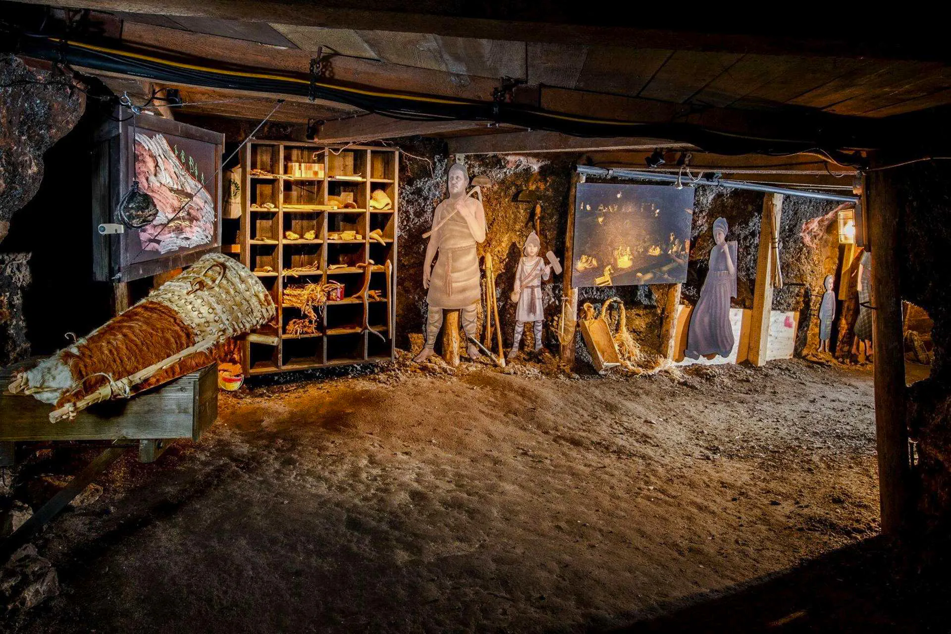 Hallstatt Salt Mine exhibit with historical figures and artifacts, part of Salzburg private tour.