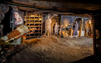 Hallstatt Salt Mine exhibit with historical figures and artifacts, part of Salzburg private tour.