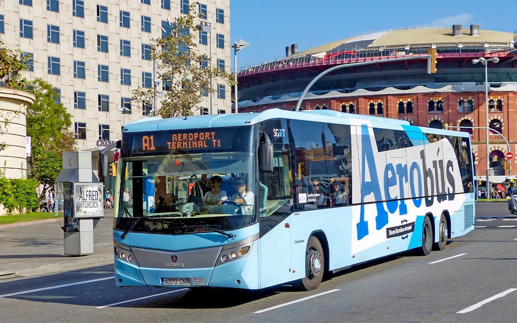 Aerobus on Barcelona street, offering transport from airport to city center.