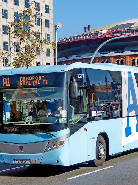 Aerobus on Barcelona street, offering transport from airport to city center.