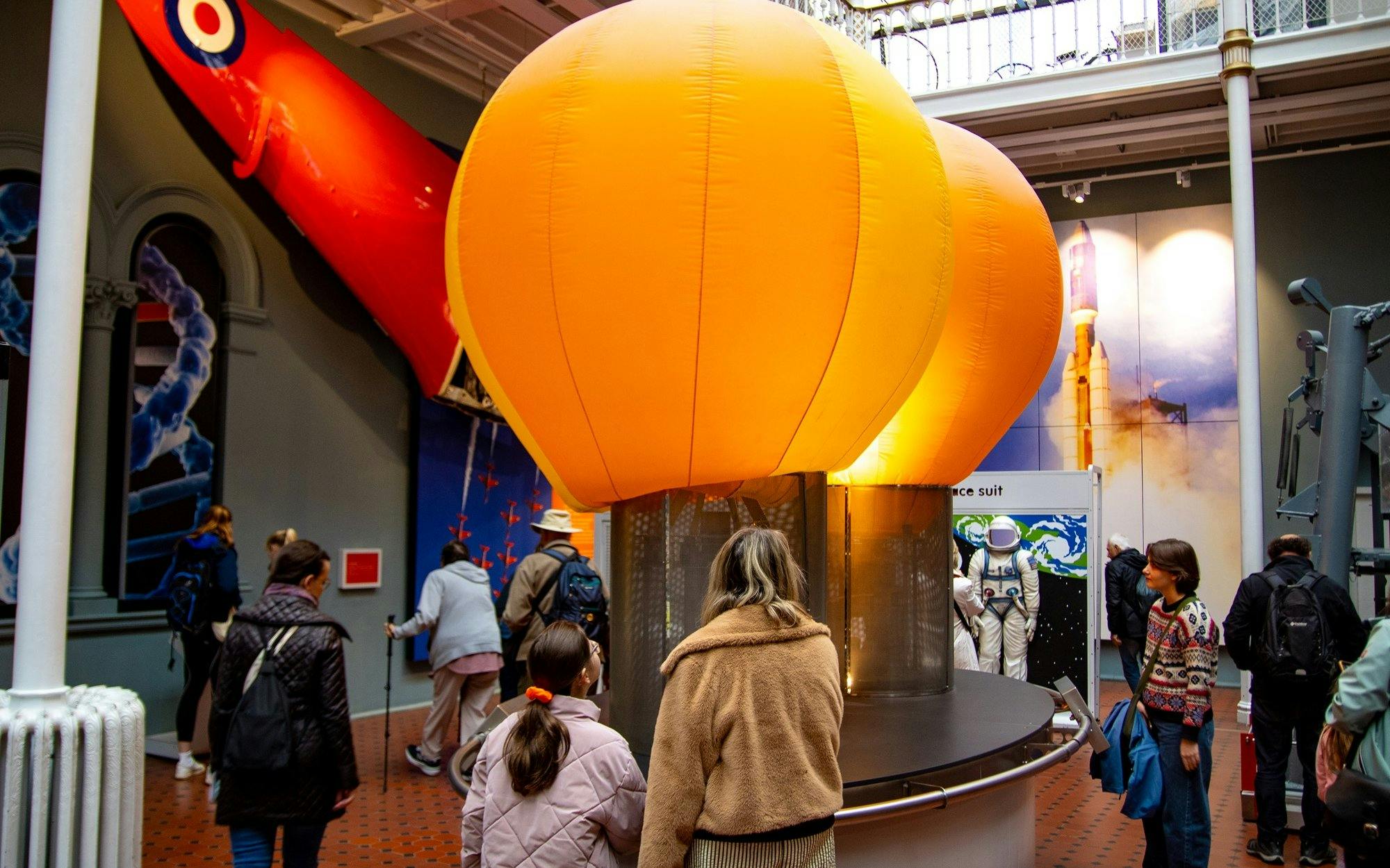 Visitors exploring the space exhibit at the National Museum of Scotland in Edinburgh.