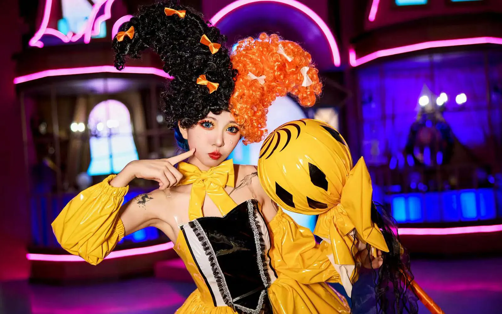 Young woman in colorful costume at Window of the World, Shenzhen.